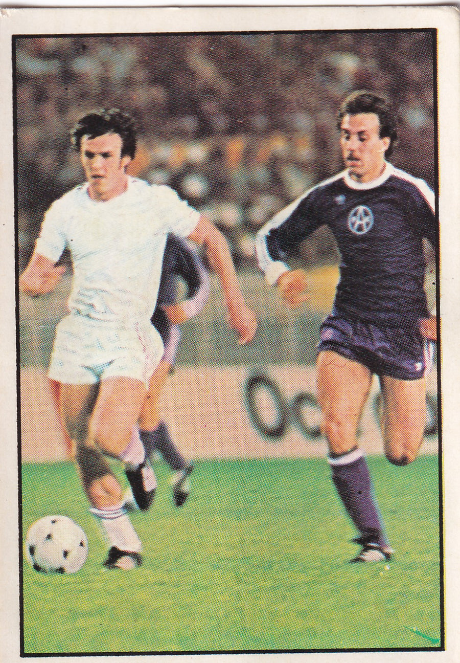 134. TWO PLAYERS RUNNING FOR THE BALL