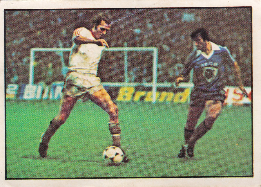 254. WHITE PLAYER DRIBBLES THE BALL