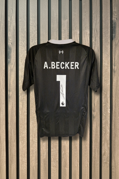 A.Becker Signed Shirt on Wood Background