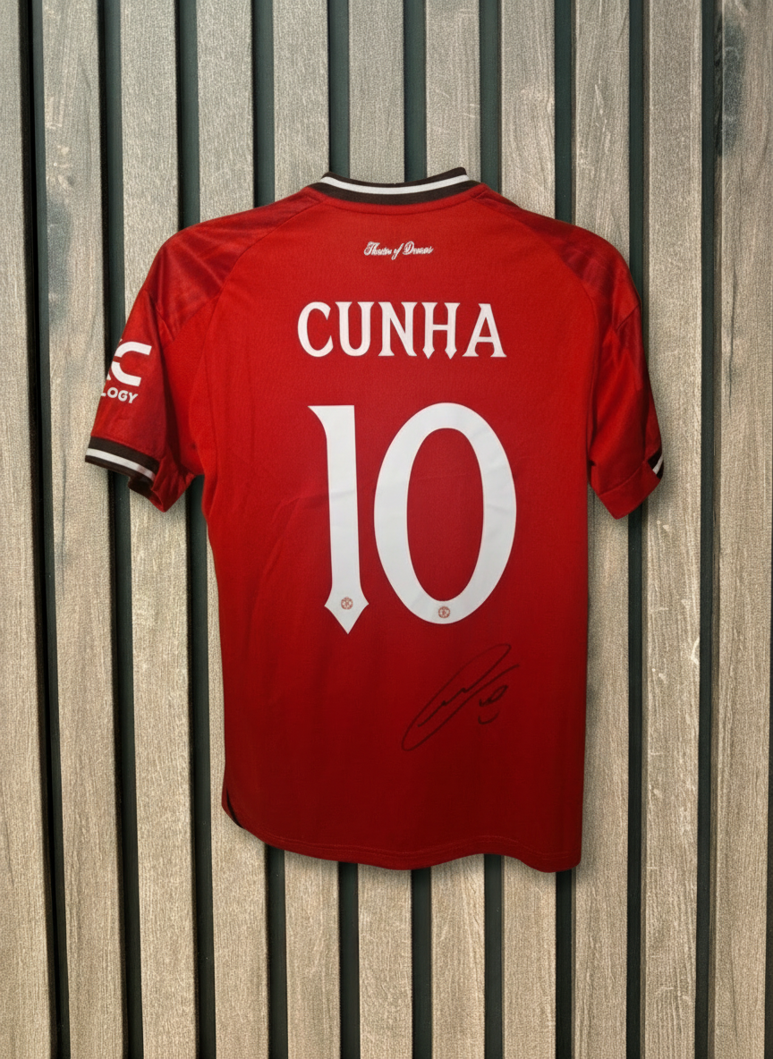 Cunha signed shirt with wooden background