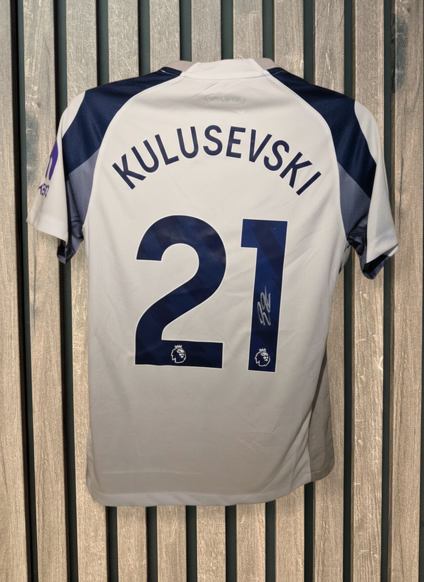 Kulusevski Jersey on Wooden Background