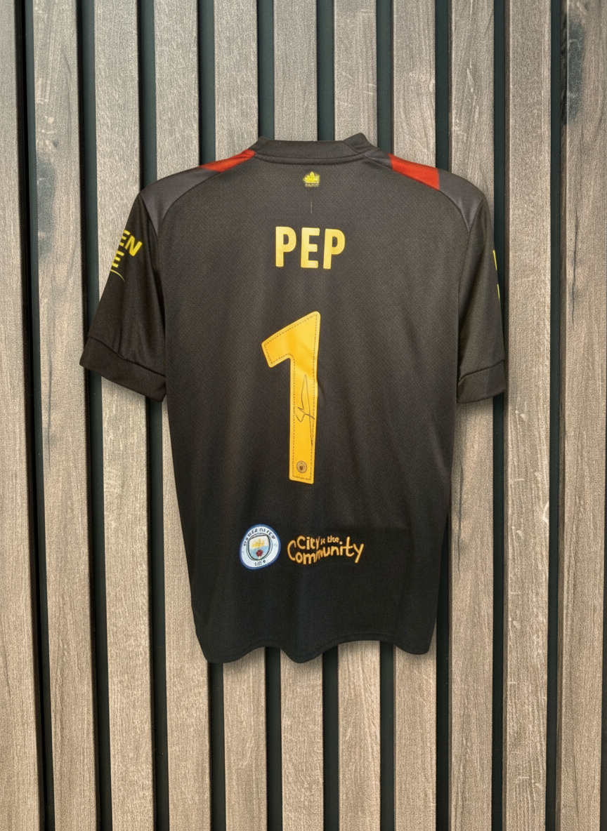 Pep signed shirt with wooden background