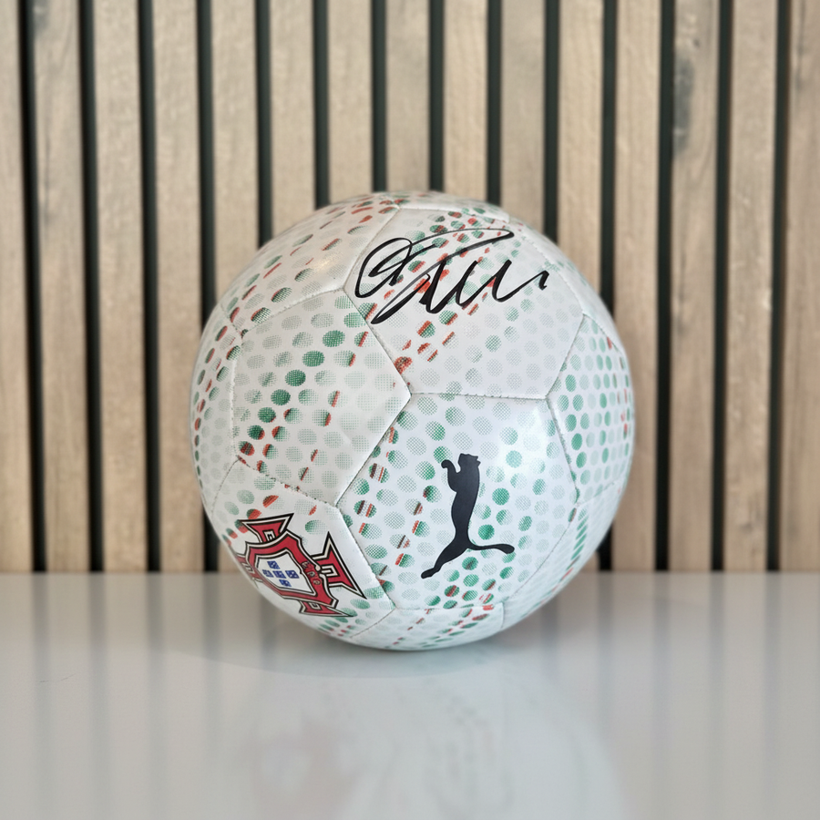Signed Portugal Ball on Wood Background