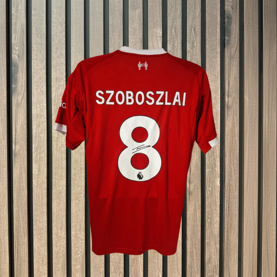 Szoboszlai shirt on wood background