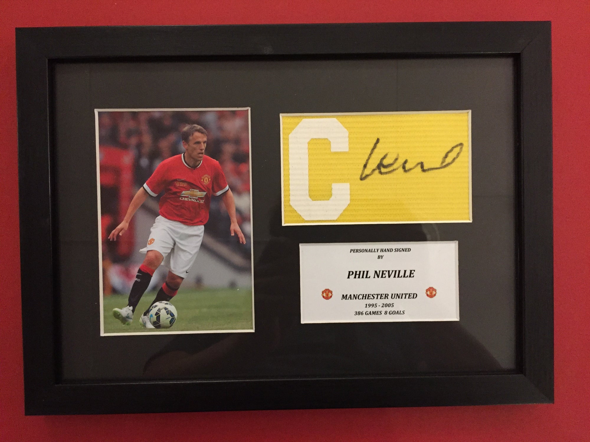 PHIL NEVILLE - SIGNERT KAPTEINSBIND MED EKTEHETSGARANTI/COA