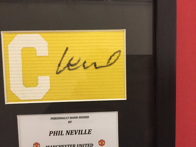 PHIL NEVILLE - SIGNERT KAPTEINSBIND MED EKTEHETSGARANTI/COA
