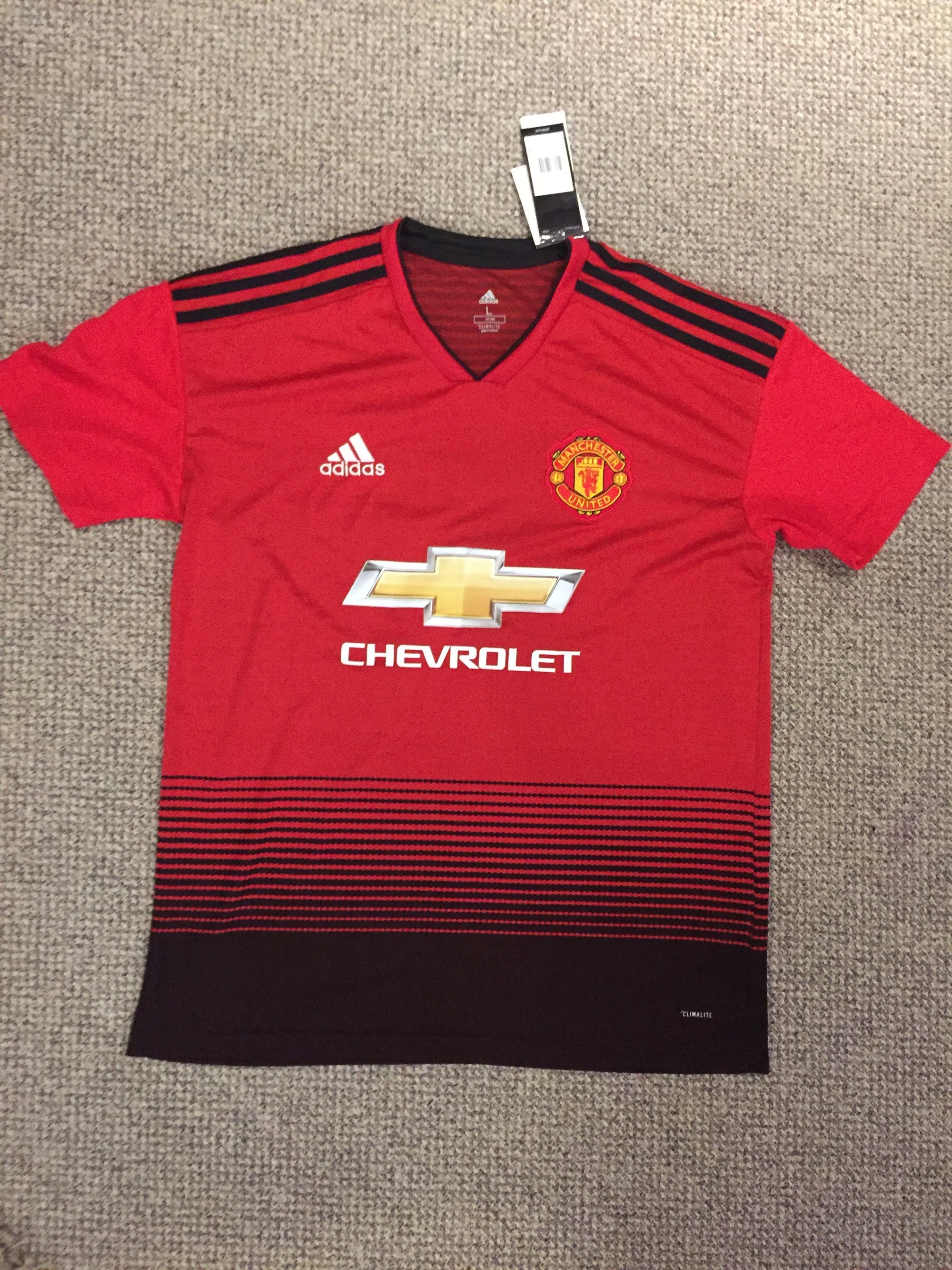 CHRIS SMALLING - SIGNERT DRAKT MED EKTEHETSBEVIS/COA