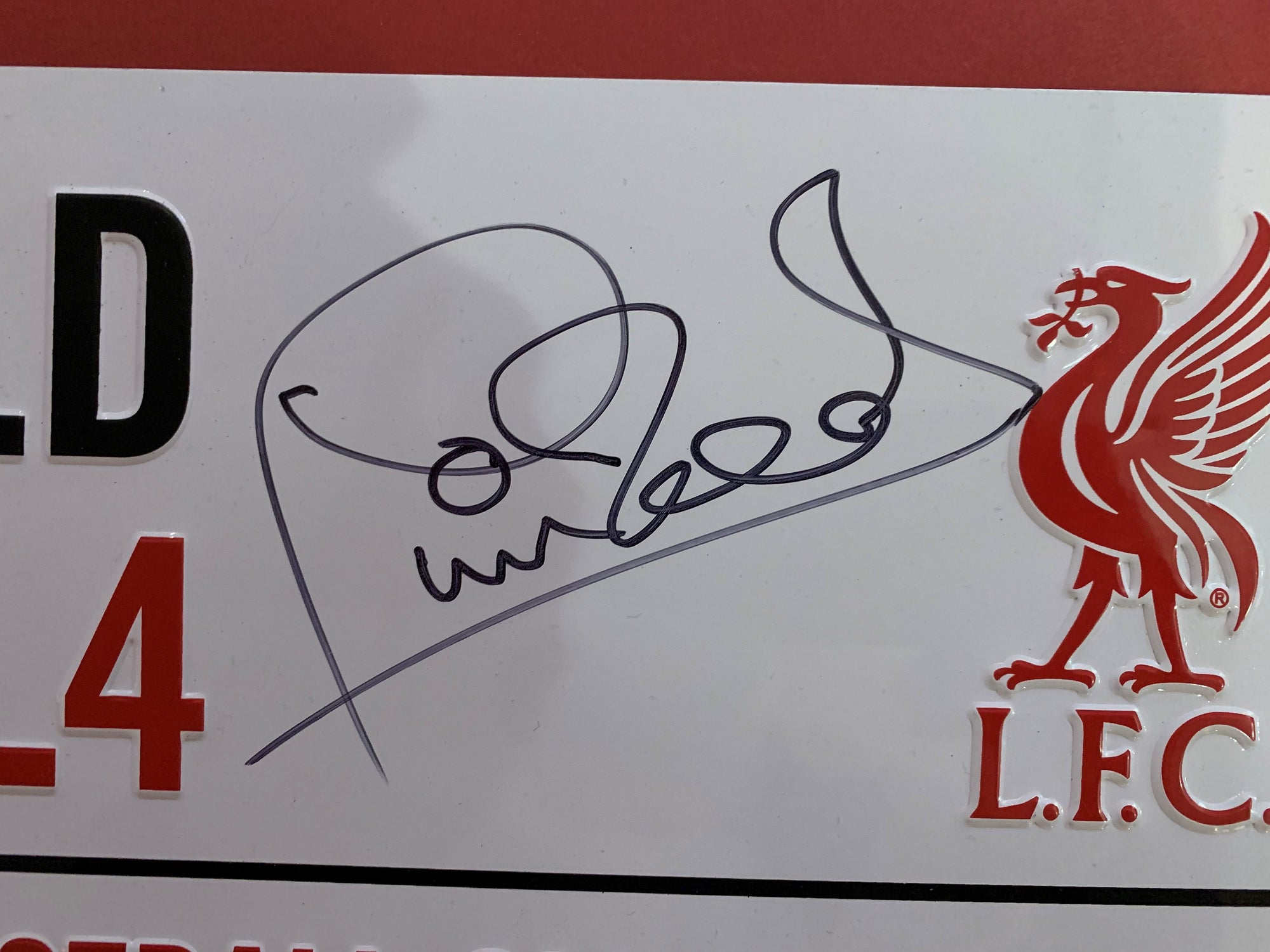 LIVERPOOL - PHIL NEAL - SIGNERT ANFIELD ROAD SKILT MED EKTEHETSBEVIS/COA